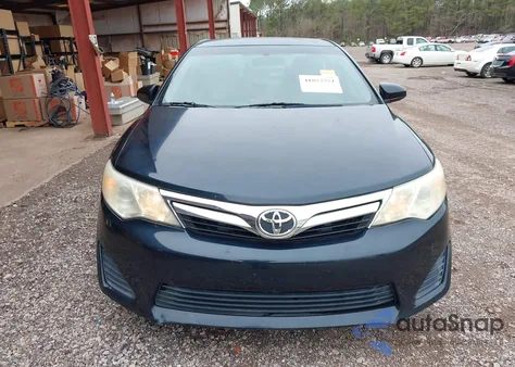 2014 Toyota Camry Le z USA, uszkodzony, nr VIN 4T4BF1FK5ER396059
